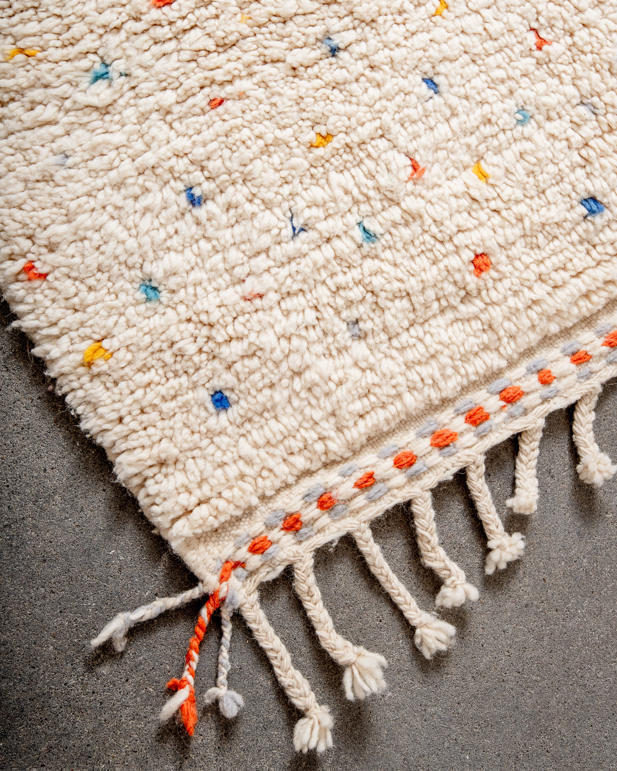 Modern, designer, handcrafted Berber rug from Morocco. Beniourain carpet with beautiful colours and patterns and fluffy wool texture.